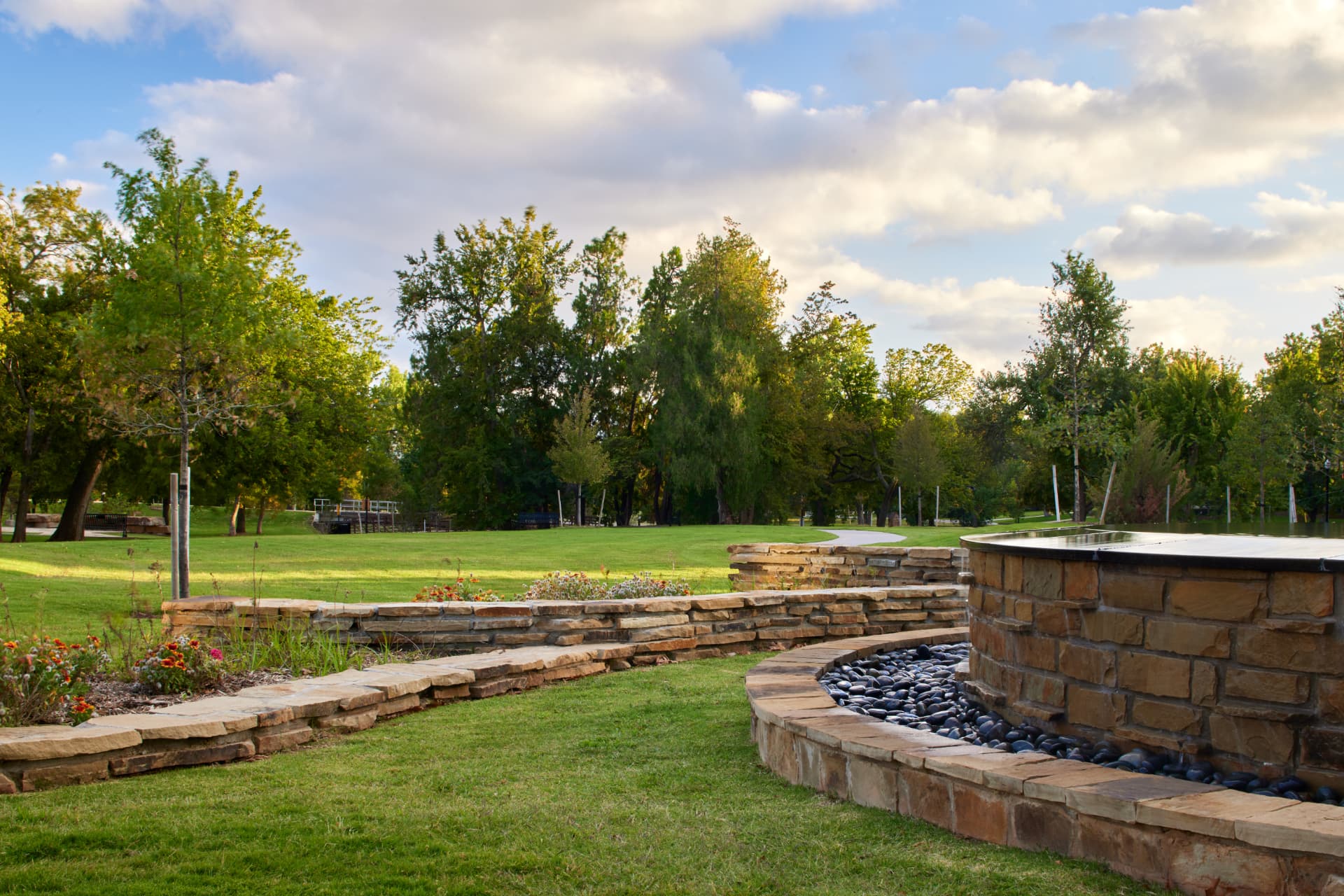 Stone seat walls and plantings