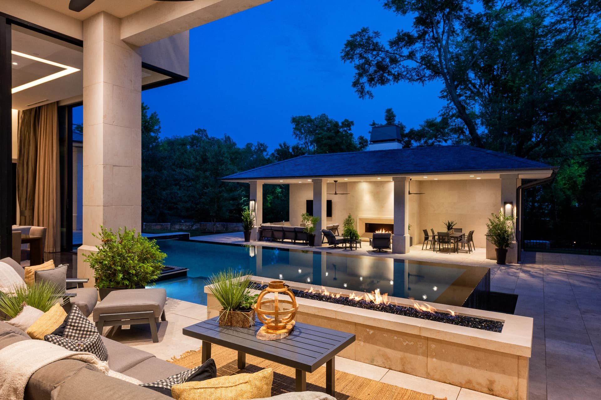 Evening view across the fire trough toward the pool cabana